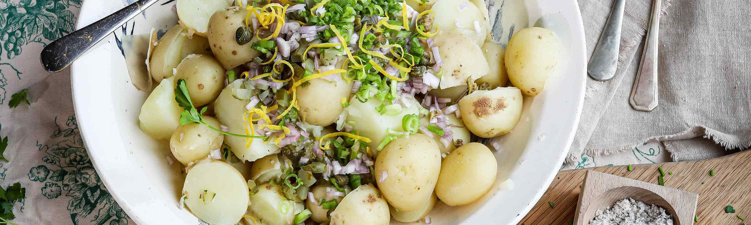 Potatoes in ground with dirt