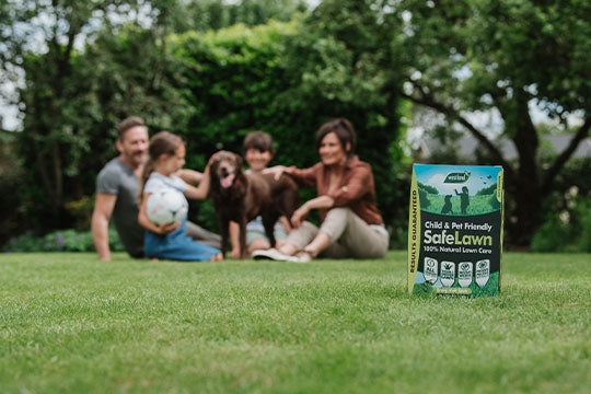 Westland Safelawn on grass with family