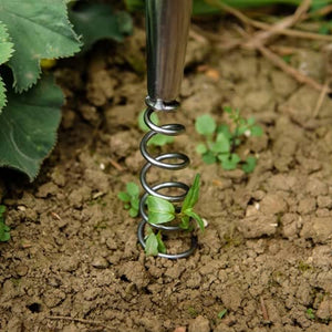 Kent and Stowe Stainless Steel Hand Corkscrew Weeder in soil